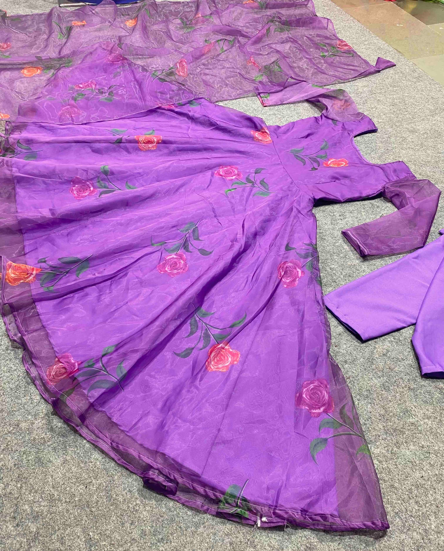 amazing purple colored party wear embroidered soft net anarkali style gown