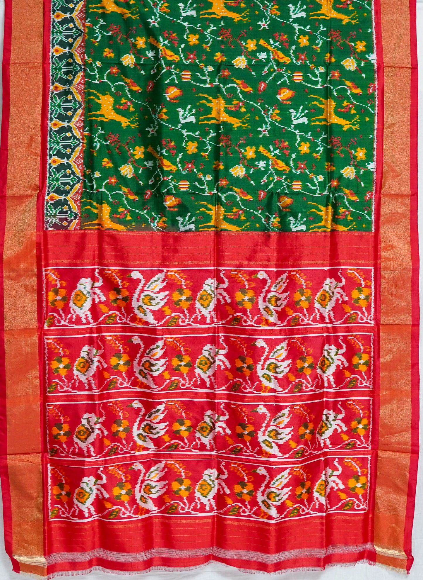 dark green patan patola saree with red accents – authentic double ikat silk weave