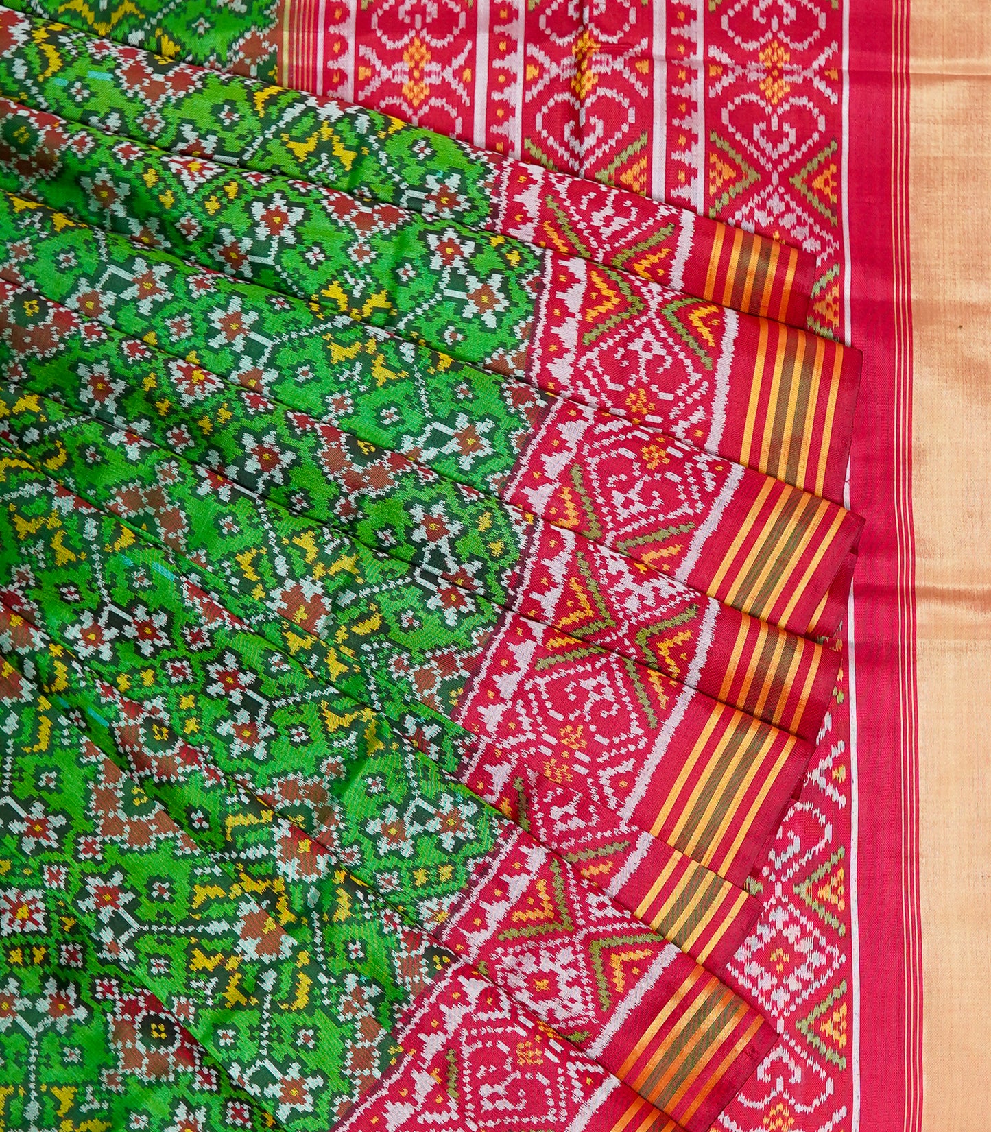 light green patan patola saree with red border – traditional double ikat elegance