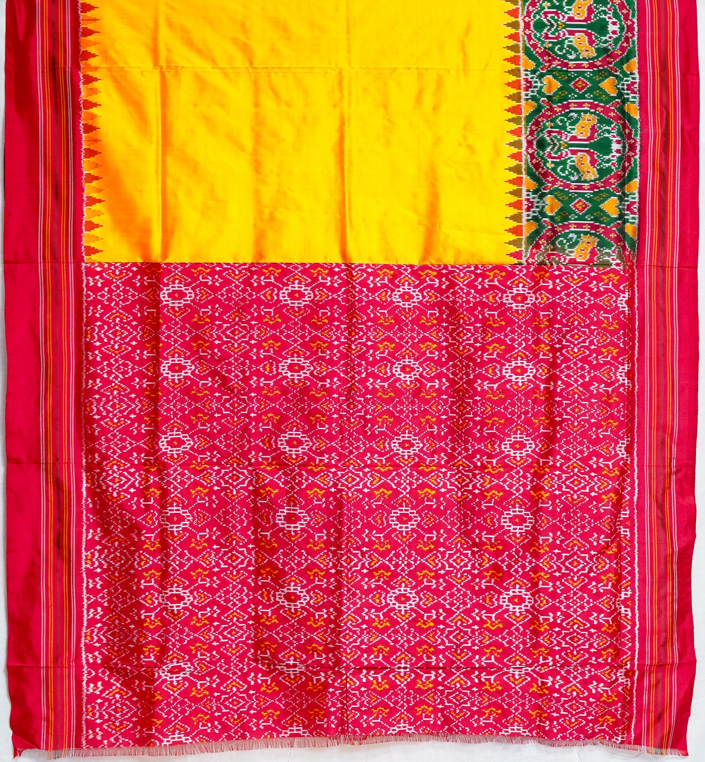 yellow patan patola saree with green & red accents – handwoven heritage weave