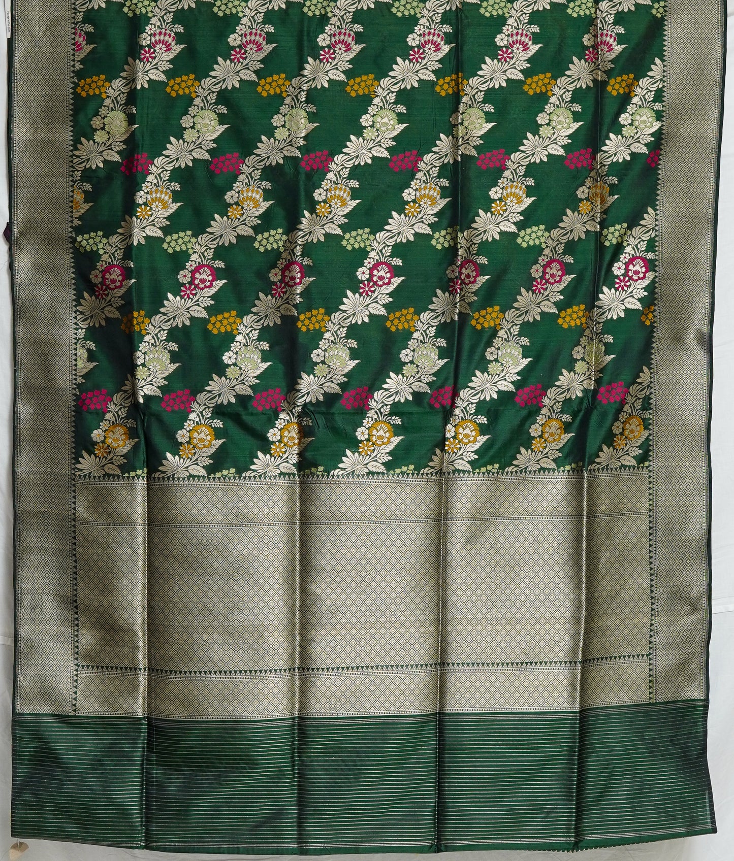 emerald elegance banarasi saree – rich green with silver zari highlights