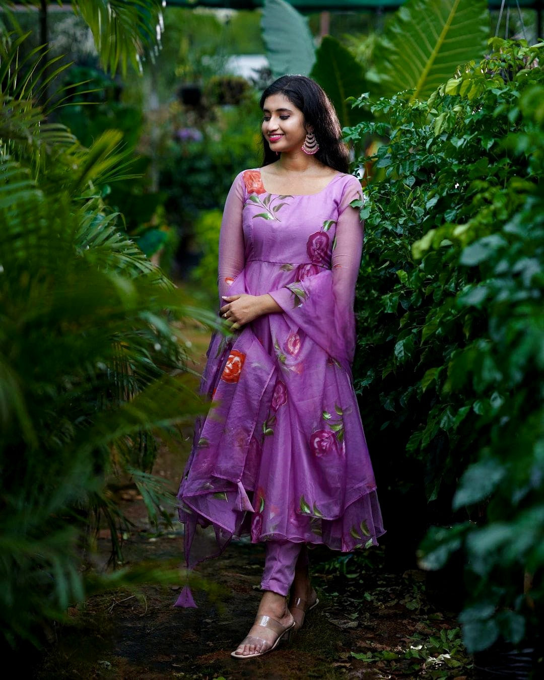 amazing purple colored party wear embroidered soft net anarkali style gown