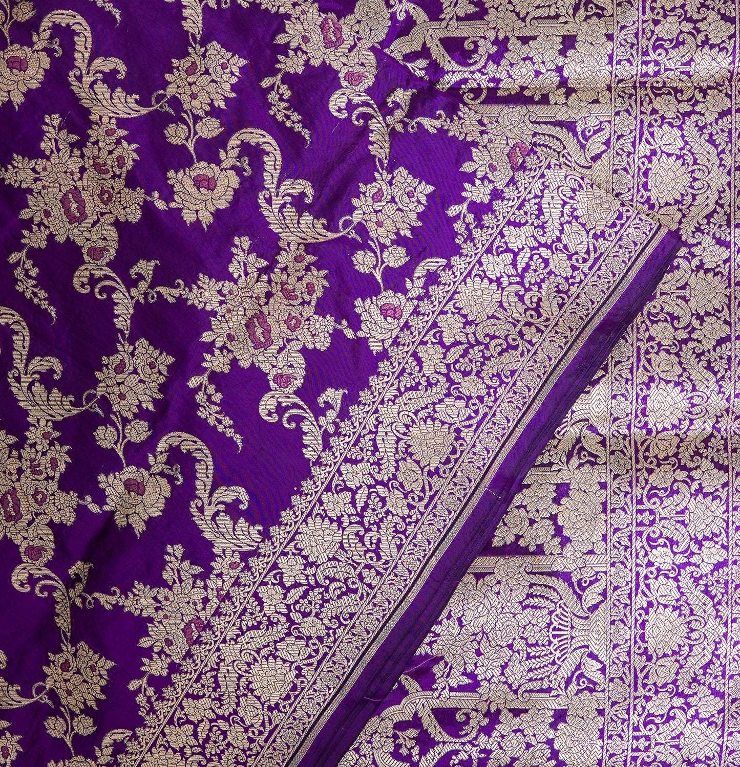 amethyst glow banarasi saree – royal purple with antique copper zari work