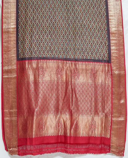 Shakti Kalamkari Saree – Bold Black with Red Border & Copper Zari Detailing
