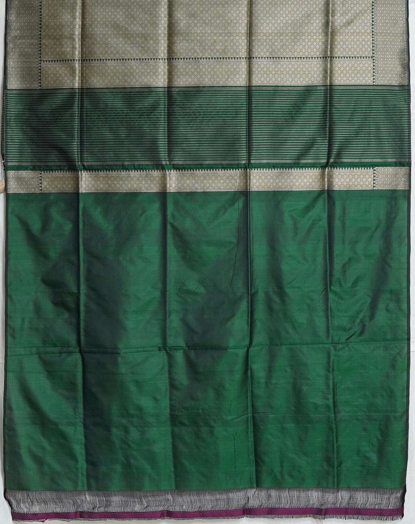 emerald elegance banarasi saree – rich green with silver zari highlights
